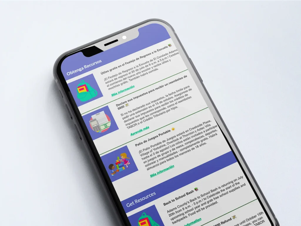 A phone showing an email newsletter from Maiker Housing Partners in english and spanish