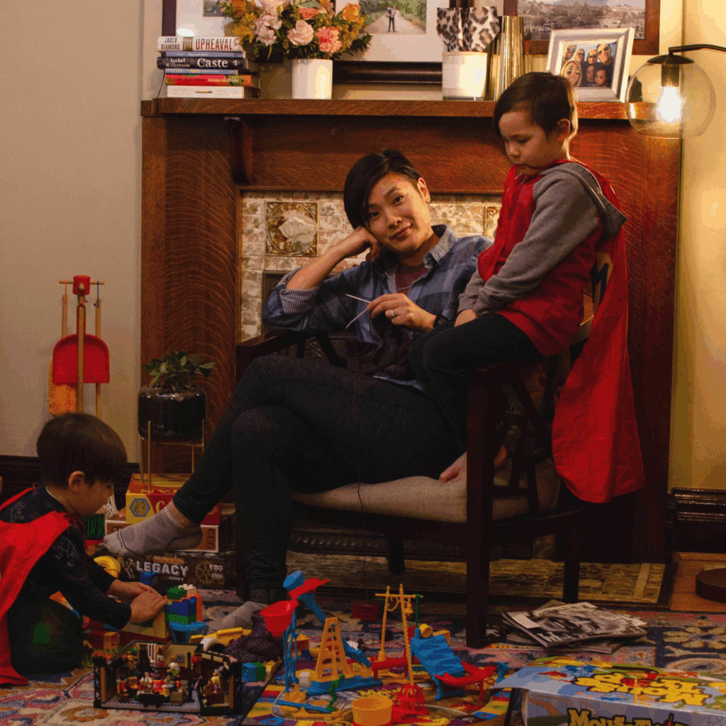 Jinha and her two sons playing with legos