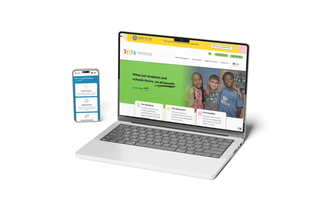 Laptop and iphone with DPS Foundation website homepage pulled up