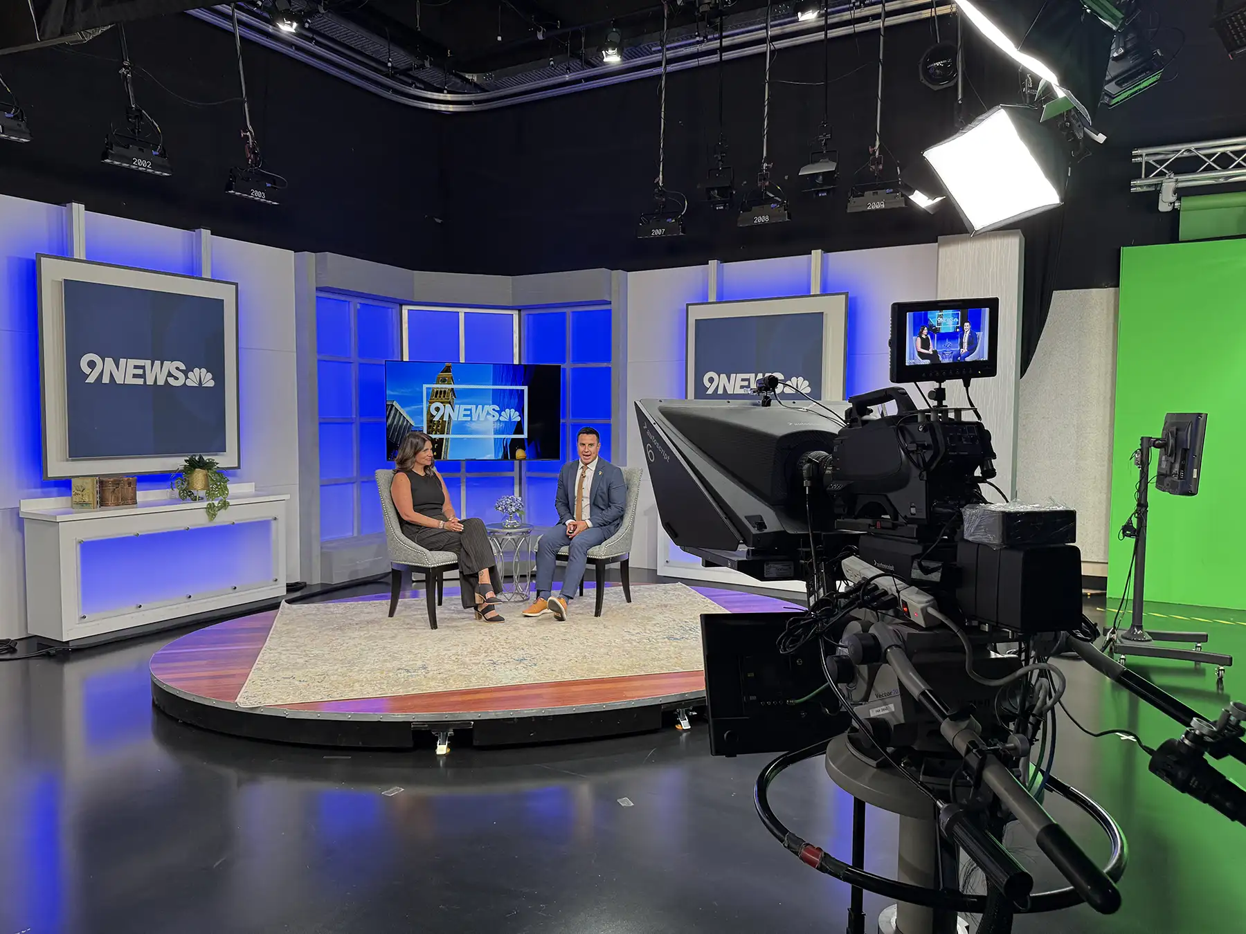 An interview taking place at the 9News studio with The Center on Colfax