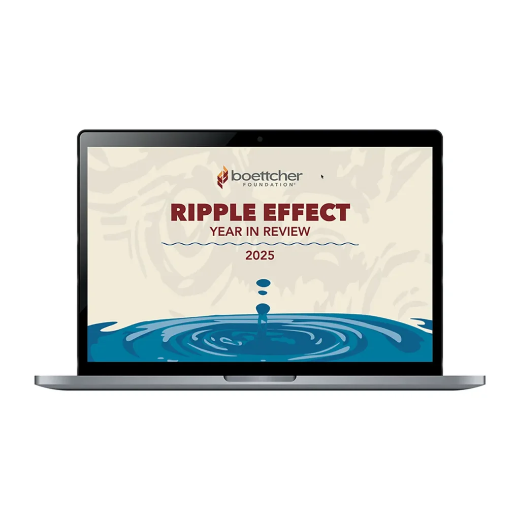 A mockup of the Boettcher digital annual report on a laptop