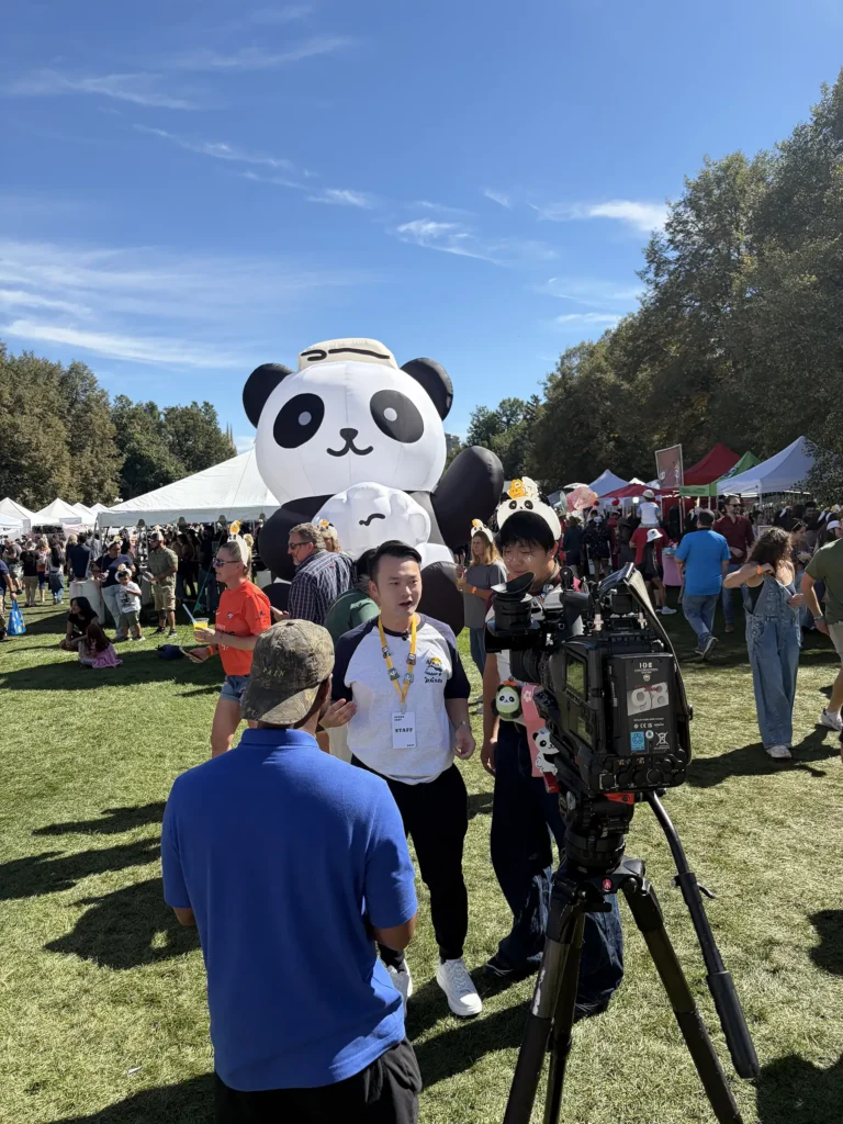 Panda Fest staff being interviewed at the festival